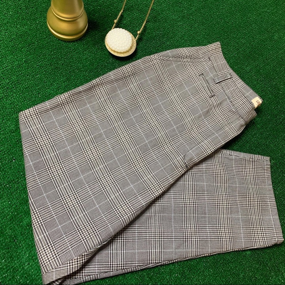 Houndstooth print with baby blue strips trousers 
Size 16